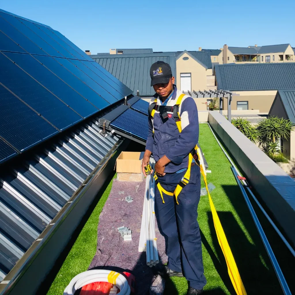 man installing solar panels in stellenbosch