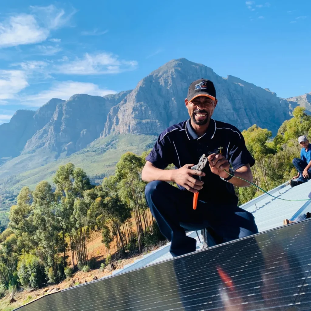 man installing solar panel in stellenbosch